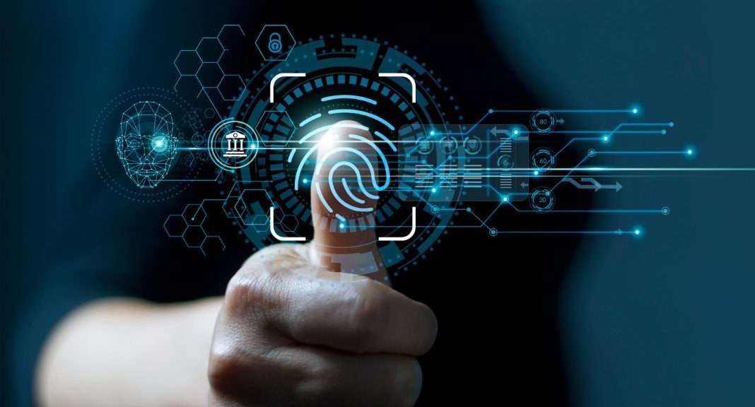 Image of a man using fingerprint identification for accessing personal financial data, showcasing eKYC biometrics security