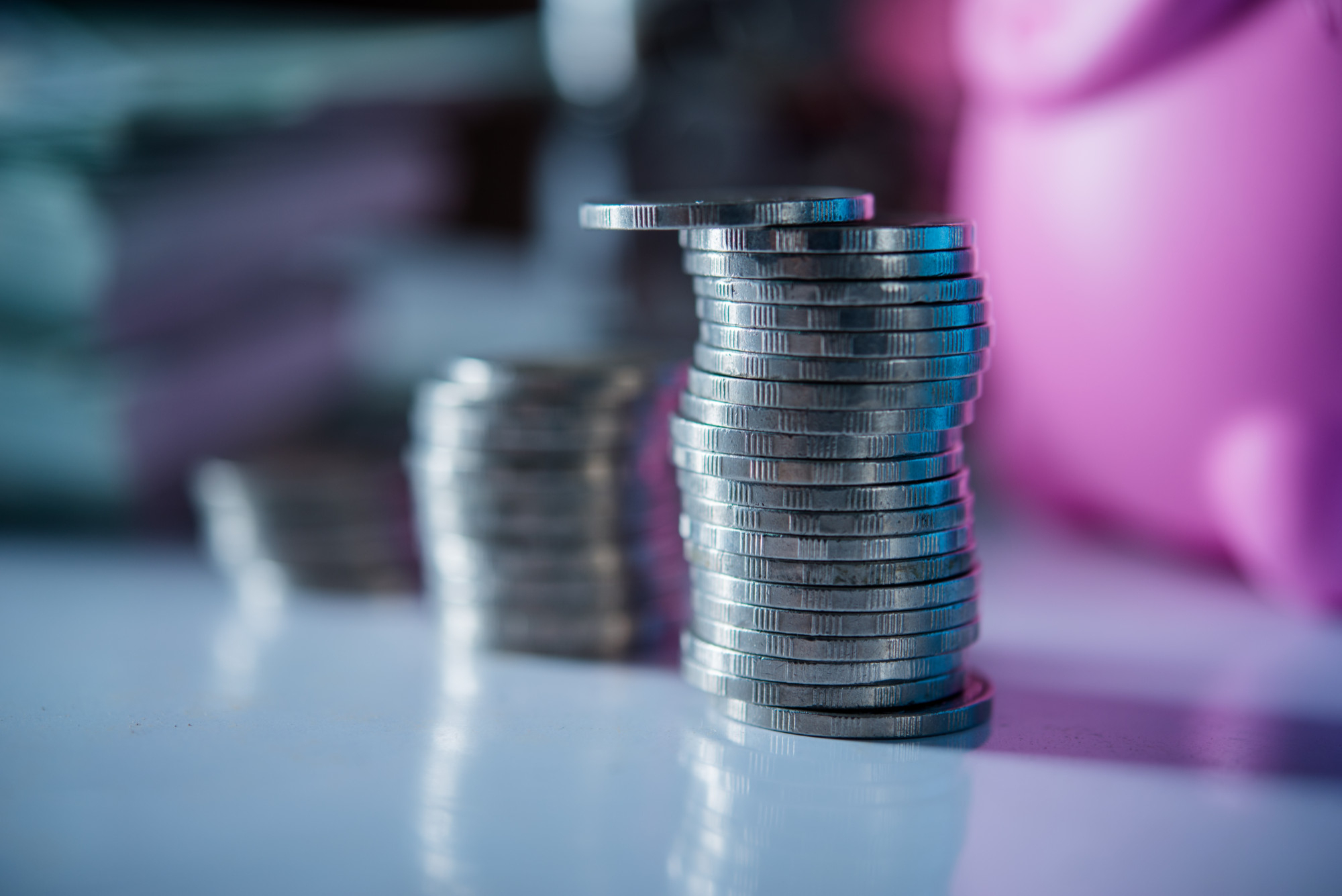 cash with coins in saving money concept